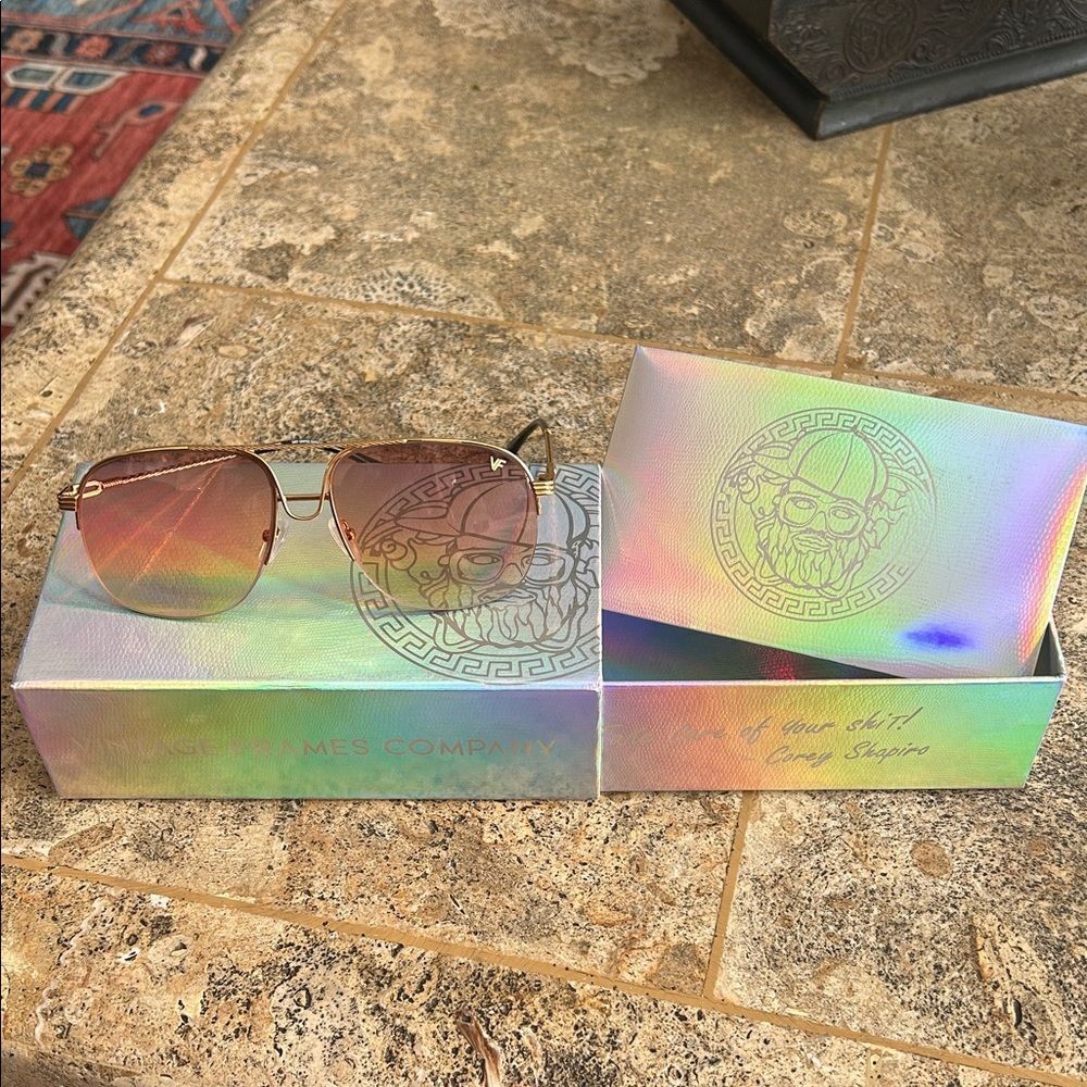 brand new vintage frame company 
Gold Sunglasses with Iridescent Box